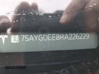 2024 Tesla Model Y Long Range с VIN 7SAYGDEE8RA226229, выставлен на аукционе Copart как лот 56722755 с пробегом Не указан миль и Списание • Salvage title. История ставок и продаж доступна на DreamBid. Изображение 13.