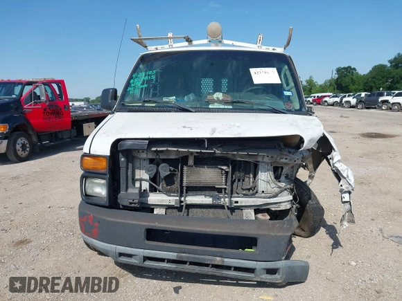 2014 Ford Econoline Cargo Commercial with VIN 1FTNE1EW4EDB20183, listed as a IAAI auction lot 42231075 with 260,818 mi miles and . Bid and sale history available at DreamBid. Image 12.