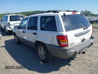 2002 Jeep Grand Cherokee Laredo with VIN 1J4GW48SX2C247709, listed as a IAAI auction lot 42444030 with 196,591 mi miles and . Bid and sale history available at DreamBid. Image 3.