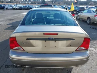 2004 Ford Focus SE with VIN 1FAFP34354W167961, listed as a IAAI auction lot 41545304 with 128,560 mi miles and . Bid and sale history available at DreamBid. Image 16.