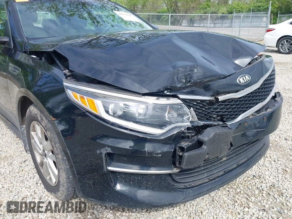 2016 Kia Optima LX with VIN 5XXGT4L32GG041760, listed as a IAAI auction lot 42175945 with 116,866 mi miles and . Bid and sale history available at carsss.com. Image 13.