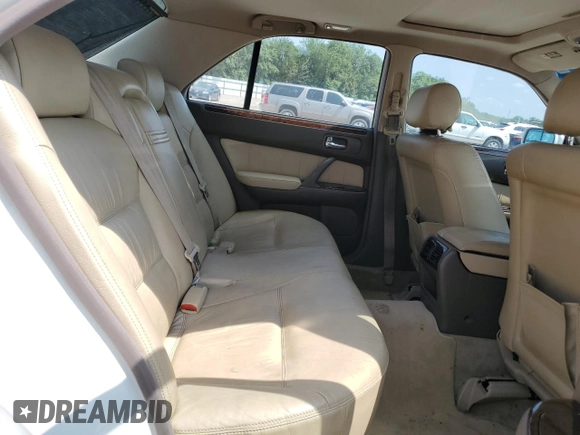 1999 Infiniti Q45 z VIN JNKBY31A2XM603477, wystawiony jako Copart lot #64216924 z przebiegiem 278 602 mil mil oraz Szkody całkowita. Historia ofert i sprzedaży dostępna na DreamBid. Obrazek 10.