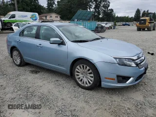 2011 Ford Fusion Hybrid with VIN 3FADP0L39BR274387, listed as a Copart auction lot 60657425 with 118,898 mi miles and Salvage title. Bid and sale history available at DreamBid. Image 4.