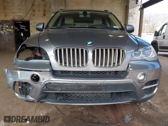 2012 BMW X5 35d with VIN 5UXZW0C59CL673416, listed as a IAAI auction lot 41910233 with 70,008 mi miles and . Bid and sale history available at DreamBid. Image 6.