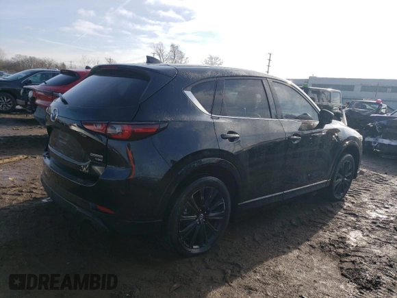 2022 Mazda CX-5 2.5 Turbo with VIN JM3KFBAY5N0647340, listed as a Copart auction lot 85123474 with 68,510 mi miles and Salvage Title. Bid and sale history available at carsss.com. Image 3.
