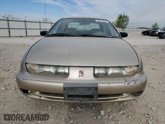 1999 Saturn SL с VIN 1G8ZK5278XZ269792, выставлен на аукционе Copart как лот 48773395 с пробегом 159 506 миль миль и Списание • Salvage title. История ставок и продаж доступна на DreamBid. Изображение 5.