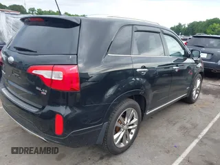 2014 Kia Sorento SX z VIN 5XYKWDA7XEG485405, wystawiony jako IAAI lot #42312938 z przebiegiem 169 728 mil mil oraz . Historia ofert i sprzedaży dostępna na DreamBid. Obrazek 4.