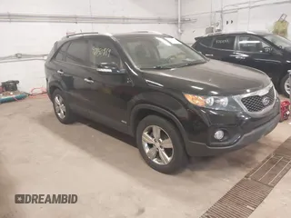 2012 Kia Sorento EX with VIN 5XYKUDA67CG306585, listed as a IAAI auction lot 42150969 with 128,792 mi miles. Bid and sale history available at carsss.com. Image 1.