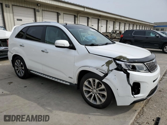 2014 Kia Sorento SX z VIN 5XYKWDA7XEG465848, wystawiony jako Copart lot #53256035 z przebiegiem 76 457 mil mil oraz Szkoda całkowita • Salvage title. Historia ofert i sprzedaży dostępna na DreamBid. Obrazek 4.