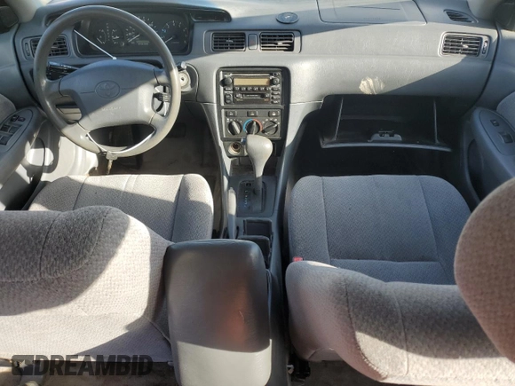 2000 Toyota Camry CE with VIN JT2BG22K0Y0470743, listed as a Copart auction lot 51980385 with 300,464 mi miles and Salvage Title. Bid and sale history available at carsss.com. Image 8.