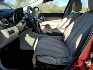 2010 Mazda CX-7 Sport with VIN JM3ER2WM4A0318665, listed as a Copart auction lot 54205525 with 164,755 mi miles and Salvage Title. Bid and sale history available at DreamBid. Image 7.