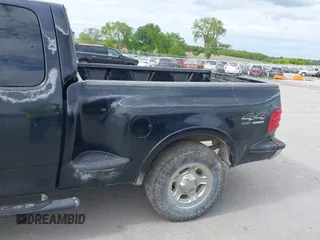 1999 Ford F-150 XL z VIN 2FTRX08L7XCA32562, wystawiony jako IAAI lot #42364671 z przebiegiem Nie podano mil oraz . Historia ofert i sprzedaży dostępna na DreamBid. Obrazek 14.