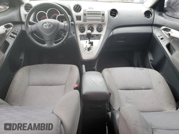 2009 Toyota Matrix S z VIN 2T1KE40E59C006733, wystawiony jako Copart lot #55076015 z przebiegiem 209 724 mil mil oraz Szkoda całkowita • Salvage title. Historia ofert i sprzedaży dostępna na DreamBid. Obrazek 8.