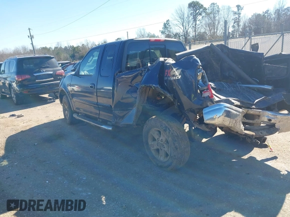 2003 Ford F-150 XL with VIN 1FTRX18L73NB36799, listed as a IAAI auction lot 41317602 with 270,075 mi miles. Bid and sale history available at carsss.com. Image 3.
