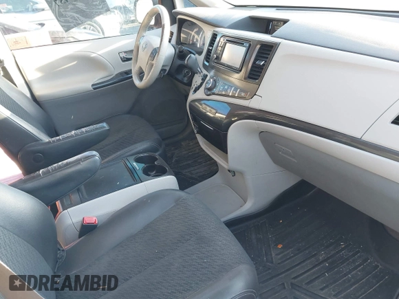 2014 Toyota Sienna SE with VIN 5TDXK3DC1ES462473, listed as a IAAI auction lot 41811437 with 209,704 mi miles and . Bid and sale history available at DreamBid. Image 5.