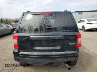 2015 Jeep Patriot High Altitude with VIN 1C4NJRAB0FD392874, listed as a Copart auction lot 52767375 with 134,522 mi miles and Salvage Title. Bid and sale history available at DreamBid. Image 6.
