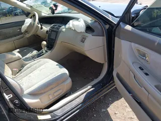 2004 Toyota Avalon XL with VIN 4T1BF28BX4U368060, listed as a IAAI auction lot 42012961 with 210,986 mi miles and . Bid and sale history available at carsss.com. Image 5.