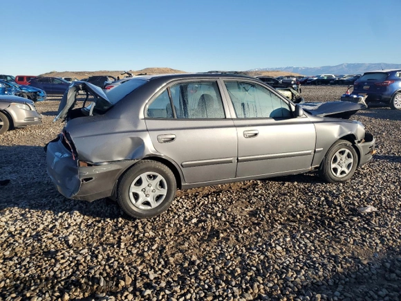 2005 Hyundai Accent GLS with VIN KMHCG45C95U592609, listed as a Copart auction lot 79048224 with 138,738 mi miles and Salvage Title. Bid and sale history available at carsss.com. Image 3.