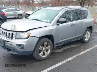 2014 Jeep Compass Sport with VIN 1C4NJDBB8ED734667, listed as a IAAI auction lot 41836914 with 221,028 mi miles. Bid and sale history available at carsss.com. Image 2.