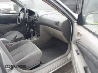 2000 Toyota Corolla VE with VIN 1NXBR12E6YZ393077, listed as a IAAI auction lot 42111914 with 181,056 mi miles and . Bid and sale history available at DreamBid. Image 5.