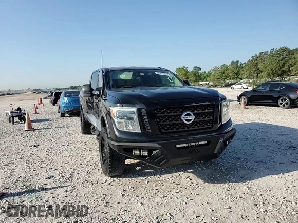 2016 Nissan Titan SL z VIN 1N6BA1F4XGN509402, wystawiony jako Copart lot #52410795 z przebiegiem 37 421 mil mil oraz Szkoda całkowita • Salvage title. Historia ofert i sprzedaży dostępna na DreamBid. Obrazek 13.