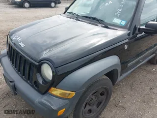 2006 Jeep Liberty Sport with VIN 1J8GL48K66W143231, listed as a IAAI auction lot 42040322 with 241,263 mi miles. Bid and sale history available at carsss.com. Image 6.