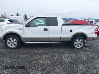 2006 Ford F-150 XLT with VIN 1FTPX14596NA27117, listed as a IAAI auction lot 41589818 with 166,727 mi miles. Bid and sale history available at carsss.com. Image 6.
