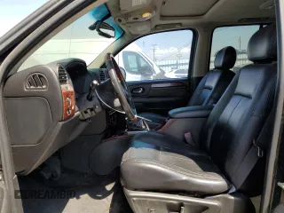 2006 GMC Envoy Denali with VIN 1GKES63M462142564, listed as a Copart auction lot 62684364 with 141,369 mi miles and Clean Title. Bid and sale history available at carsss.com. Image 7.