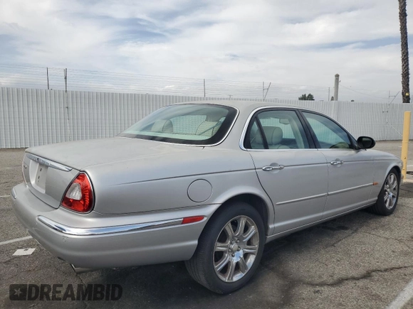 2004 Jaguar XJ Vanden Plas with VIN SAJWA74C04SG25291, listed as a Copart auction lot 56678255 with 176,597 mi miles and Clean Title. Bid and sale history available at DreamBid. Image 3.