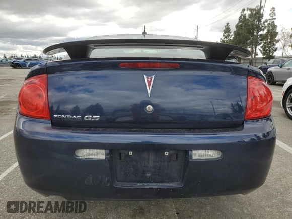 2009 Pontiac G5 with VIN 1G2AS18H997204531, listed as a Copart auction lot 48634655 with 73,936 mi miles and Salvage Title. Bid and sale history available at DreamBid. Image 6.