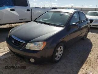 2004 Kia Spectra LX z VIN KNAFE122145052033, wystawiony jako Copart lot #47457493 z przebiegiem 148 663 mil mil oraz Czysty tytuł • Clean title. Historia ofert i sprzedaży dostępna na DreamBid. Obrazek 2.