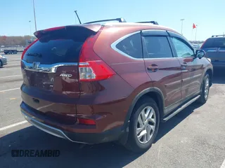 2015 Honda CR-V EX-L with VIN 2HKRM4H74FH616400, listed as a IAAI auction lot 42059162 with 120,636 mi miles and . Bid and sale history available at DreamBid. Image 4.