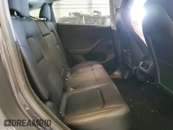 2023 Tesla Model Y Long Range z VIN 7SAYGDEE3PF862038, wystawiony jako Copart lot #57639325 z przebiegiem 11 020 mil mil oraz Szkoda całkowita • Salvage title. Historia ofert i sprzedaży dostępna na DreamBid. Obrazek 11.