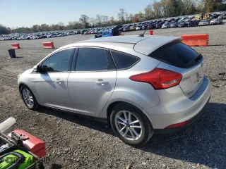 2015 Ford Focus SE with VIN 1FADP3K22FL350627, listed as a Copart auction lot 77306314 with 80,221 mi miles and Salvage Title. Bid and sale history available at carsss.com. Image 2.