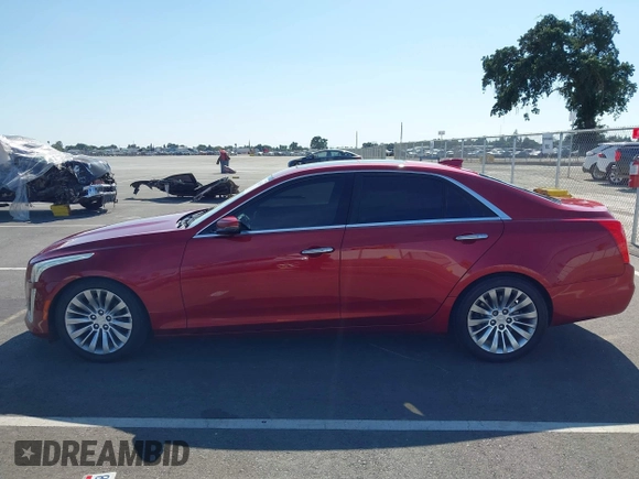 2015 Cadillac CTS Performance RWD with VIN 1G6AS5SX4F0136097, listed as a IAAI auction lot 42613633 with 173,103 mi miles and . Bid and sale history available at DreamBid. Image 14.