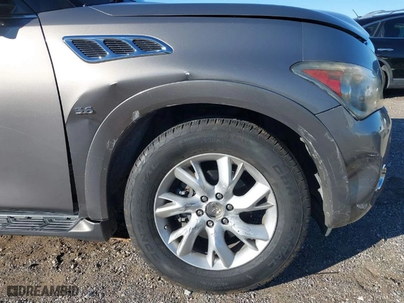 2014 Infiniti QX80 with VIN JN8AZ2ND7E9750777, listed as a IAAI auction lot 41336719 with 121,427 mi miles. Bid and sale history available at carsss.com. Image 6.