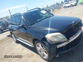 2013 Mercedes-Benz GLK with VIN WDCGG8JBXDG051067, listed as a IAAI auction lot 42107151 with 123,576 mi miles. Bid and sale history available at carsss.com. Image 1.