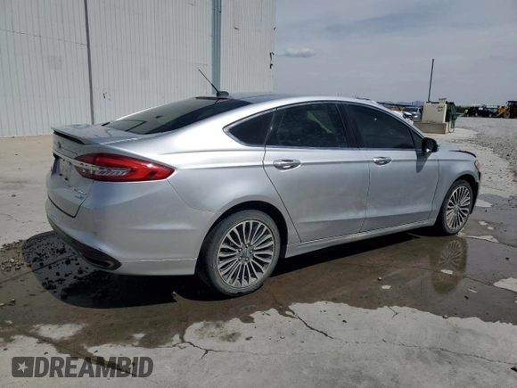 2018 Ford Fusion Titanium z VIN 3FA6P0D96JR155318, wystawiony jako Copart lot #53740505 z przebiegiem 86 567 mil mil oraz Szkoda całkowita • Salvage title. Historia ofert i sprzedaży dostępna na DreamBid. Obrazek 3.