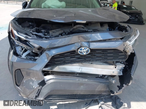 2023 Toyota RAV4 Hybrid LE with VIN JTMLWRFV6PD203044, listed as a IAAI auction lot 42320080 with 95,747 mi miles and . Bid and sale history available at DreamBid. Image 6.