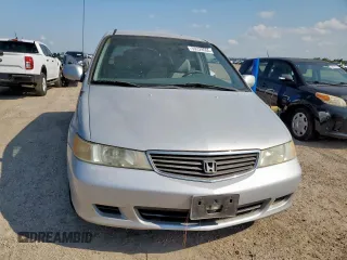 2001 Honda Odyssey EX z VIN 2HKRL18641H619203, wystawiony jako Copart lot #59329555 z przebiegiem 180 058 mil mil oraz Czysty tytuł • Clean title. Historia ofert i sprzedaży dostępna na DreamBid. Obrazek 5.