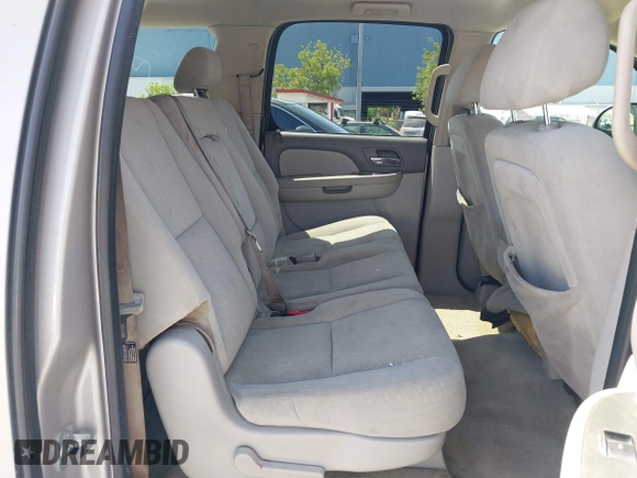2007 Chevrolet Suburban LS with VIN 1GNFC16027J202168, listed as a IAAI auction lot 42100210 with Not Provided miles and . Bid and sale history available at DreamBid. Image 8.