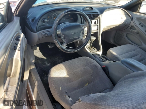 1997 Ford Mustang with VIN 1FALP4043VF174092, listed as a Copart auction lot 86983884 with 105,774 mi miles and Salvage Title. Bid and sale history available at carsss.com. Image 8.