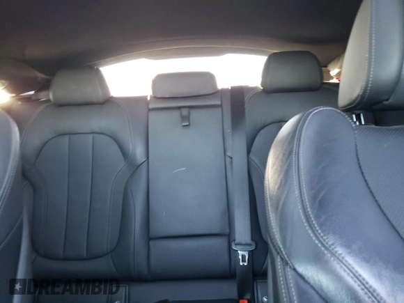 2020 BMW X6 xDrive40i z VIN 5UXCY6C03L9D00816, wystawiony jako Copart lot #76538674 z przebiegiem Nie podano mil oraz Szkoda całkowita • Salvage title. Historia ofert i sprzedaży dostępna na DreamBid. Obrazek 10.