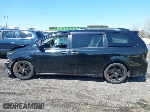 2015 Toyota Sienna SE with VIN 5TDXK3DC4FS581586, listed as a IAAI auction lot 41893274 with 263,577 mi miles. Bid and sale history available at carsss.com. Image 14.