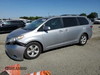 2015 Toyota Sienna LE AAS with VIN 5TDKK3DC7FS577297, listed as a Copart auction lot 62464625 with 153,138 mi miles and Salvage title. Bid and sale history available at DreamBid. Image 1.