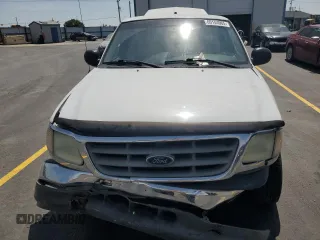 2003 Ford F-150 XL with VIN 2FTRX17L23CA17128, listed as a Copart auction lot 60144965 with 121,055 mi miles and Salvage title. Bid and sale history available at DreamBid. Image 5.