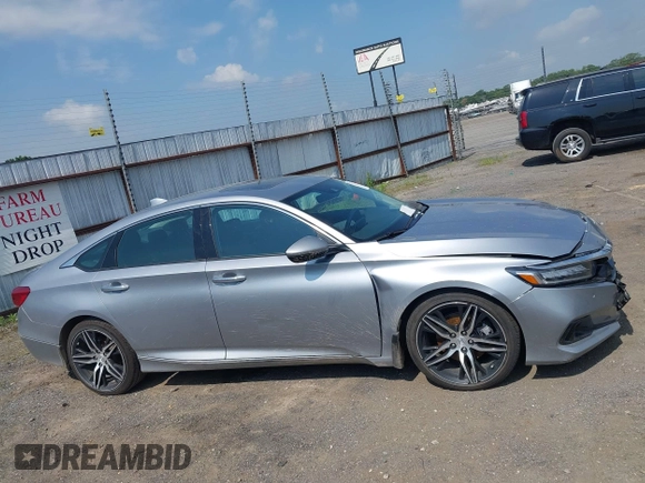 2021 Honda Accord Touring with VIN 1HGCV2F99MA014738, listed as a IAAI auction lot 42392129 with 25,802 mi miles and . Bid and sale history available at DreamBid. Image 13.