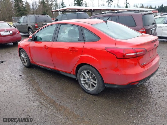 2016 Ford Focus SE with VIN 1FADP3F29GL268809, listed as a IAAI auction lot 41873067 with 135,593 mi miles. Bid and sale history available at carsss.com. Image 3.