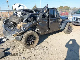 2019 Jeep Wrangler Unlimited Sport S with VIN 1C4HJXDGXKW500313, listed as a IAAI auction lot 41022680 with 82,864 mi miles and . Bid and sale history available at DreamBid. Image 4.