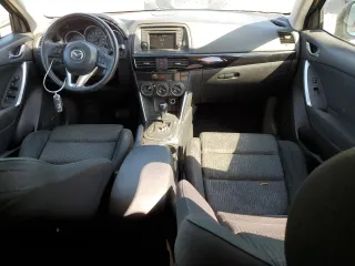 2013 Mazda CX-5 Touring with VIN JM3KE4CE7D0109173, listed as a Copart auction lot 52594285 with 149,288 mi miles and Clean Title. Bid and sale history available at DreamBid. Image 8.